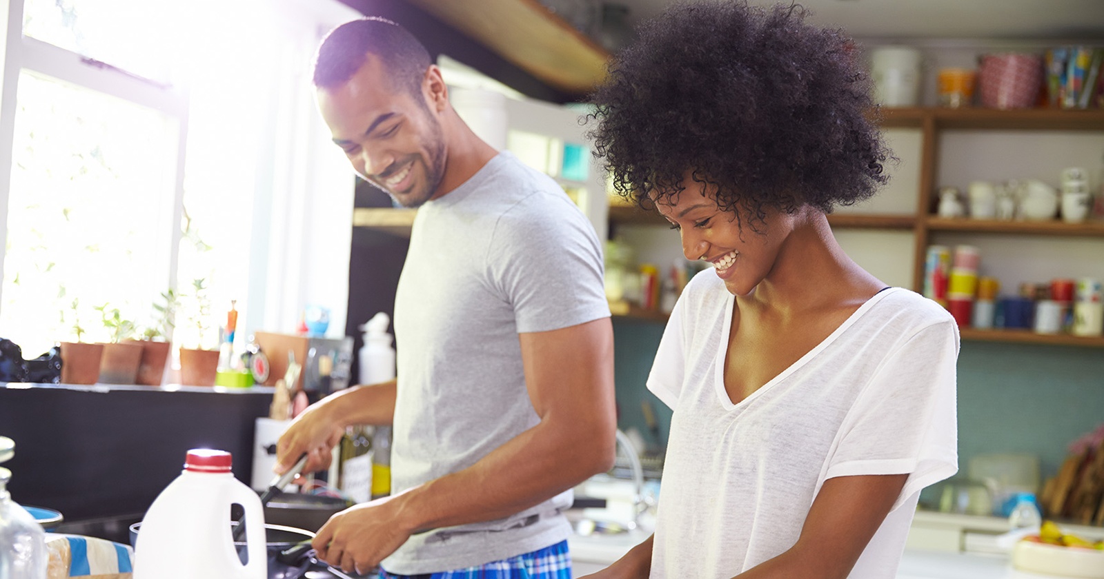 Young Couple Making Breakfast