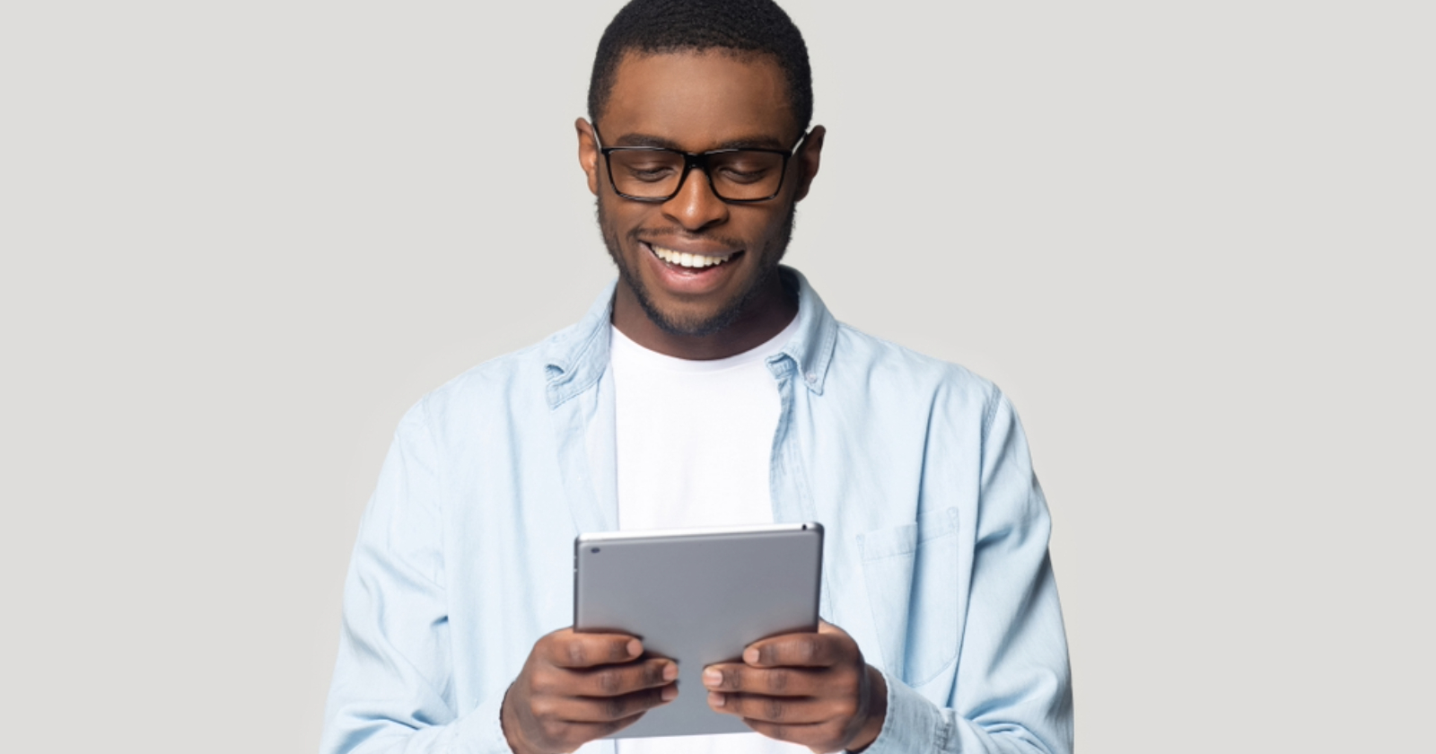 Handsome guy on his tablet