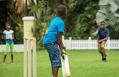 Kids Playing Cricket